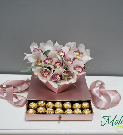 Heart-shaped box with white orchids photo 394x433
